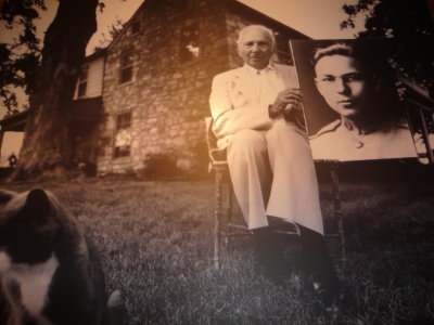 Frank Buckles In Later Years Holding A Picture Of Himself As A Soldier